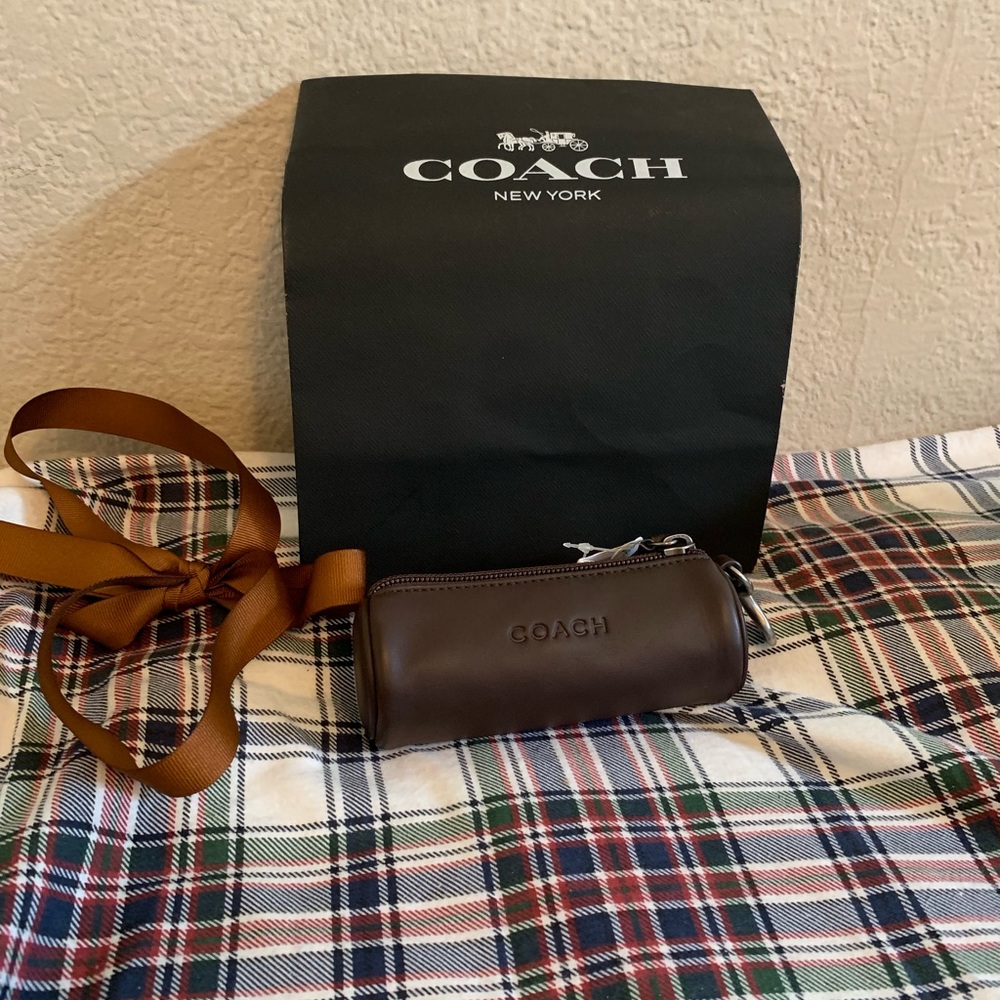 Coach golf ball case with golf balls